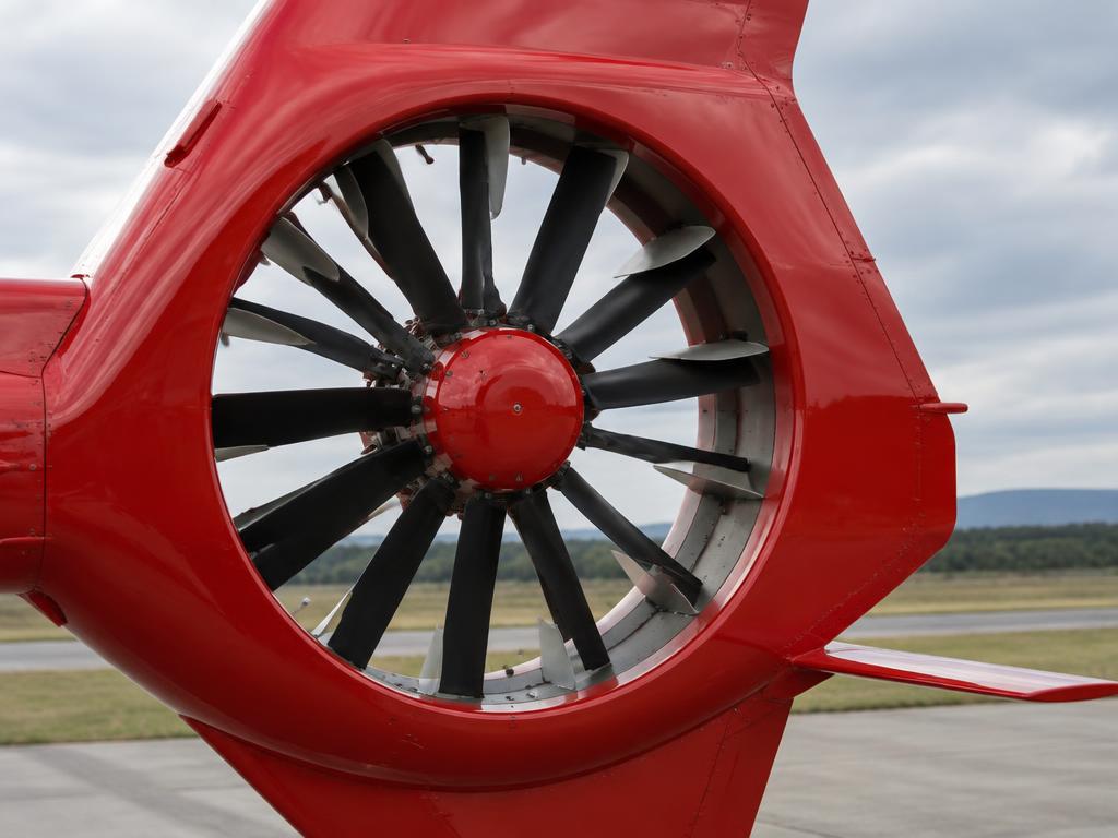 Fenestron shrouded tail rotor with stator vanes
