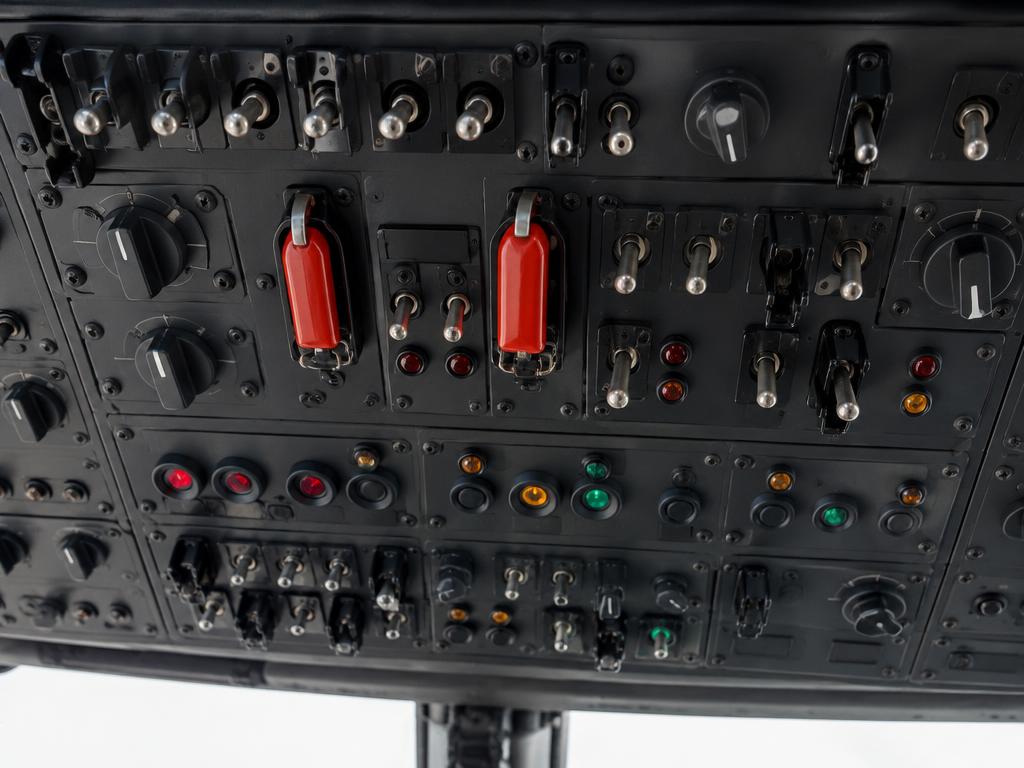Overhead panel: BATT, GEN 1/2, ENG 1/2 MAIN, fuel pumps/prime, lights, pitot heat, fire extinguishing